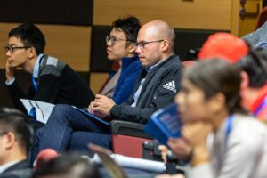 Attendees intently focused during a conference on Google Search Engine Optimization Certification